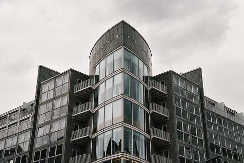 office building black building during daytime city